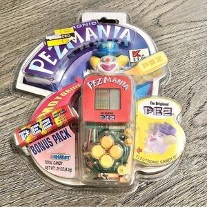 TOY QUEST Pez mania electronic Video game handheld 1999 Manley NIP Sealed